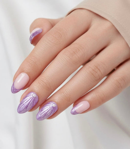 Hand with purple nail Ariel Clawture false press on nails on a white background
