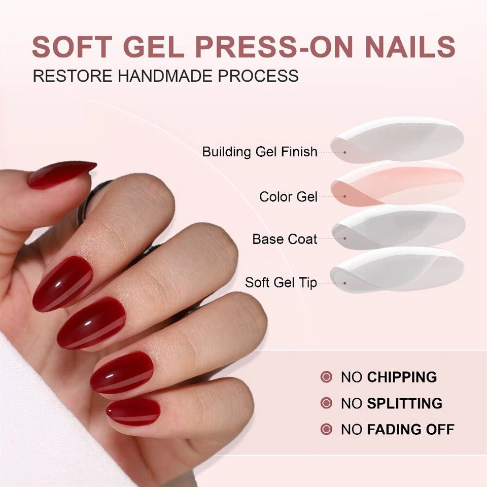 Hand with red nails showing soft gel Red Wine Clawture press on nails with product components displayed.