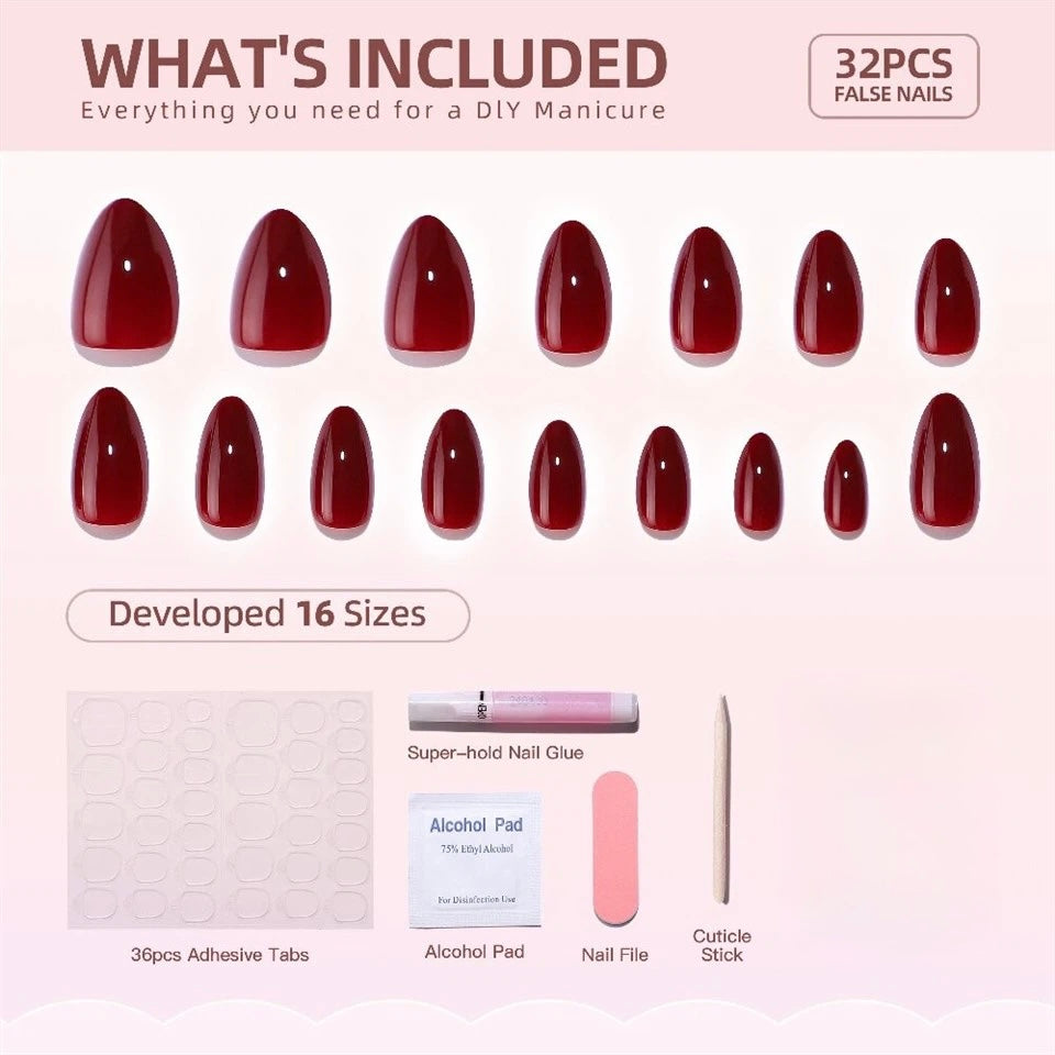 Set of 32 Red Wine Clawture press on false nails with nail care tools on a pink background