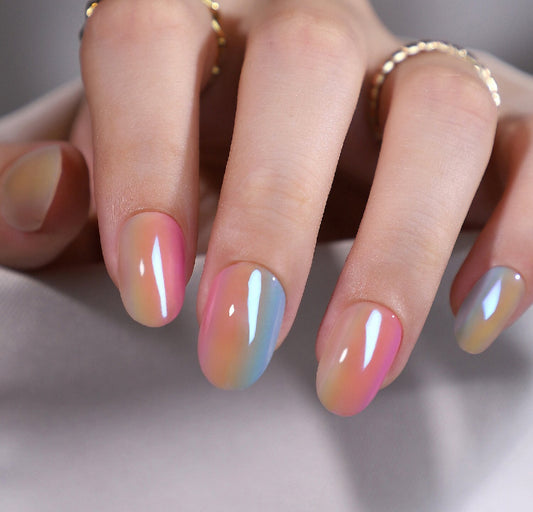 Close-up of a hand with chroma clawture press on nails on a neutral background