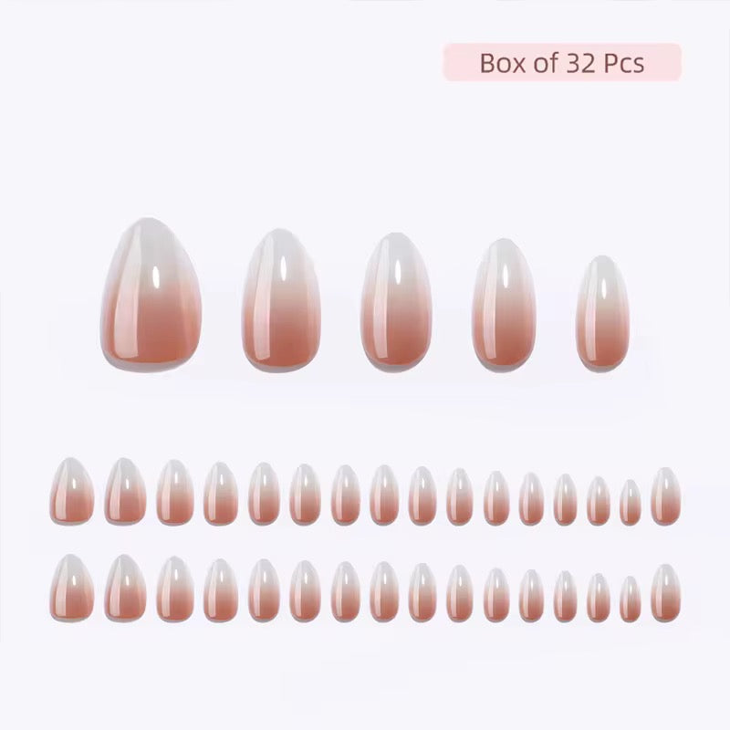 Box of 32 classy clawture press on nails with ombre effect on a white background