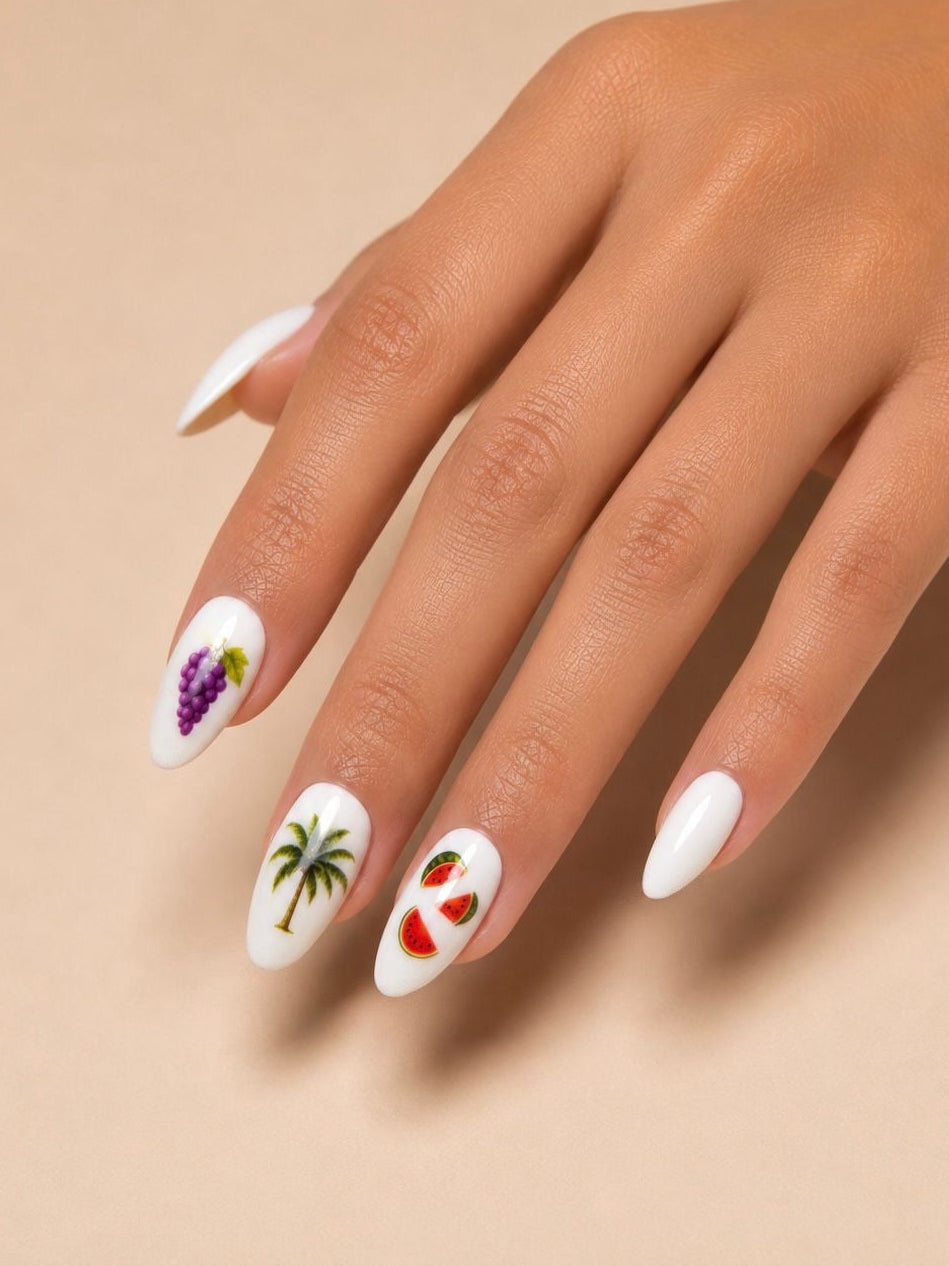 Hand with white clawture tropic mix featuring tropical designs on a beige background