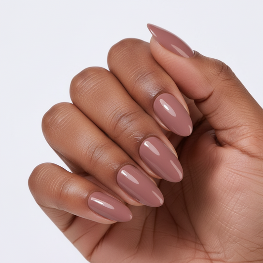 Hand with dark pink nails on a white background dusty rose clawture press on nails
