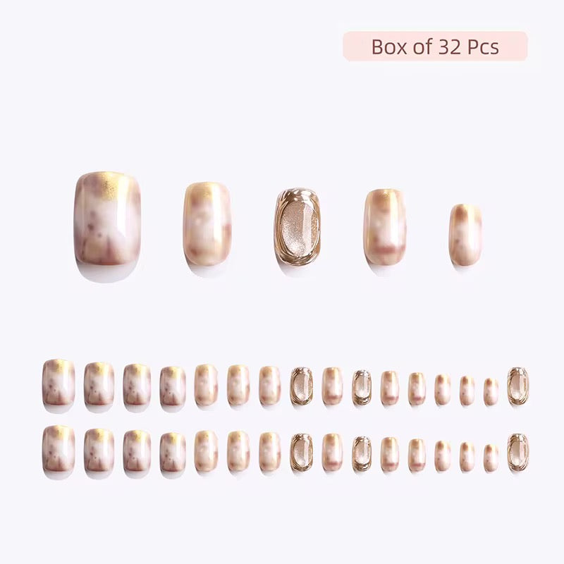Set of marbled nail art tips displayed on a white background with 'Box of 32 Pcs' text. Clawture press on nails