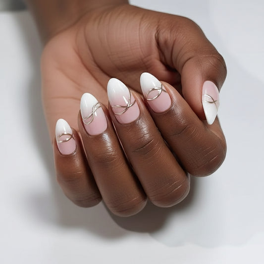Clawture Luxury Lines press on nails with white, pink and silver design on a white background.