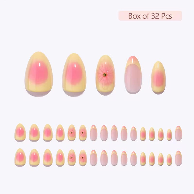 Set of Clawture Sunset Bloom pink and yellow gradient nail art pieces on a white background