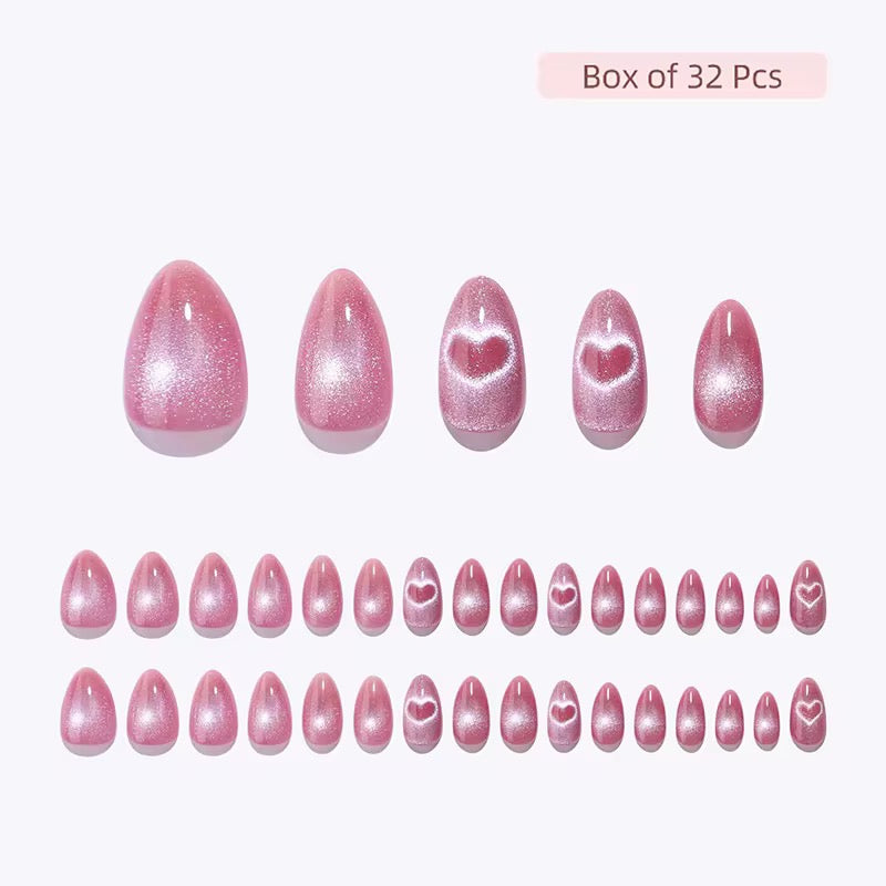 Set of pink glittery nail art decorations with heart designs on a white background valentine clawture press on nails